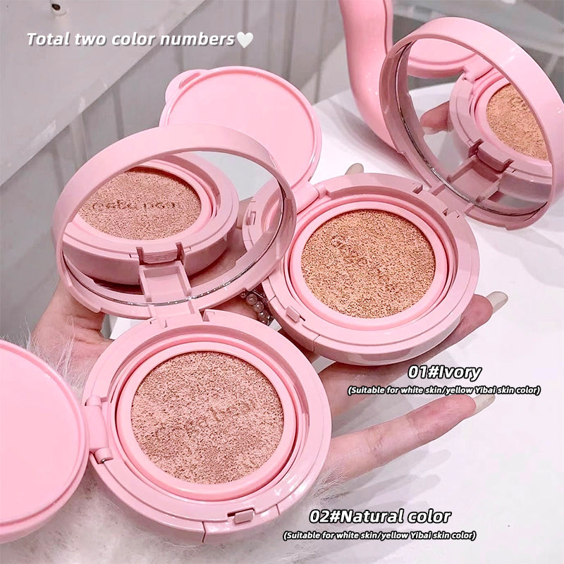Three pink makeup compacts with different shades on a white background