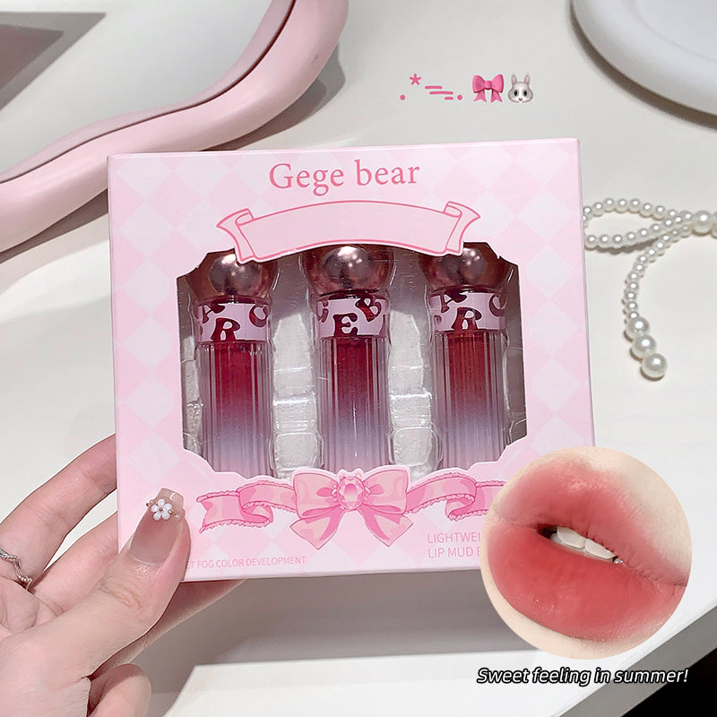Pink lip balm set with 'Gege bear' branding held by a hand, with a donut graphic and text overlay on a light background.