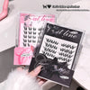 Cat's false eyelashes packaging with a hand holding one of the packages.
