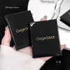 Two black compact cases with 'Gegebear' branding held by a person.