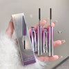Hand holding a set of purple and silver eye fiber wands with packaging.