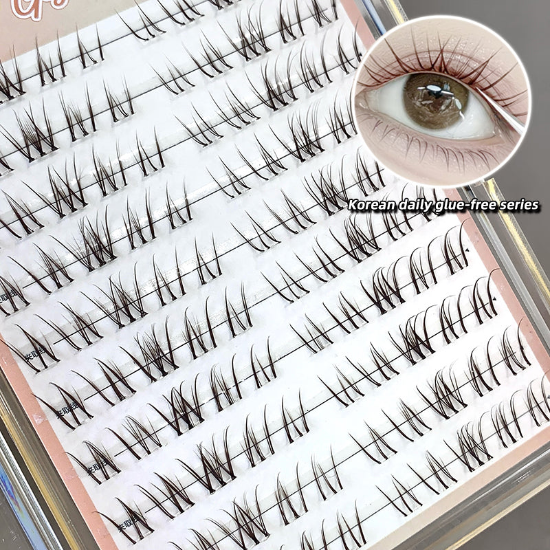 Set of false eyelashes with a close-up of an eye wearing them, labeled 'Korean daily glue-free series'.