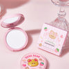Pink compact powder with a bear design and packaging on a pink background