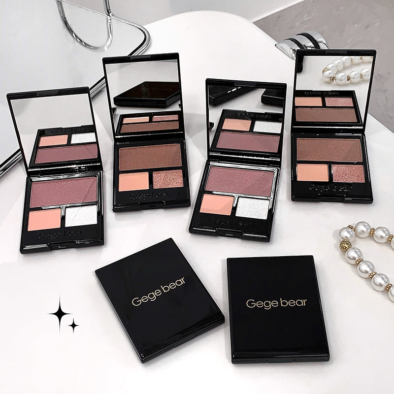 Makeup palettes with Gege bear branding on a white surface.