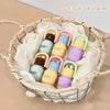 Colorful baby teething toys in a woven basket with 'GEGE BEAR' branding.