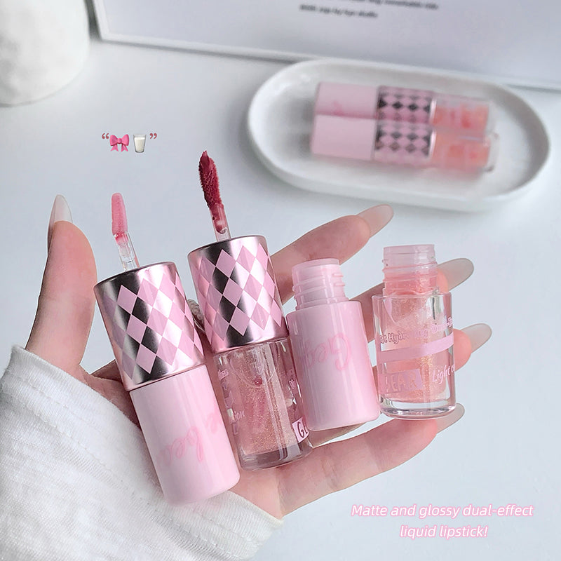 Set of pink lip products including lip glosses and a small bottle on a white background.