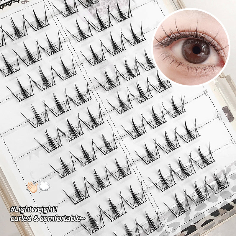 Eyelash extensions on a tray with an inset of an eye wearing the lashes.