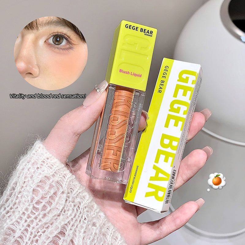 Hand holding a 'GEGE BEAR' blush liquid with packaging, close-up of product.