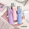 Three small cylindrical products with bow decorations held in a hand, with text 'so cuteee!'.