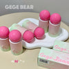 Pink and green cosmetic products with 'Gege Bear' branding on a beige surface.