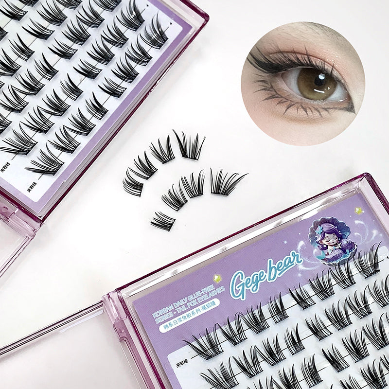 False eyelashes with packaging and an inset of an eye wearing the lashes.