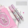Pink lip gloss with packaging featuring a cartoon rabbit on a white background