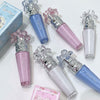 Set of Gege bear lip glosses in various colors on a white background
