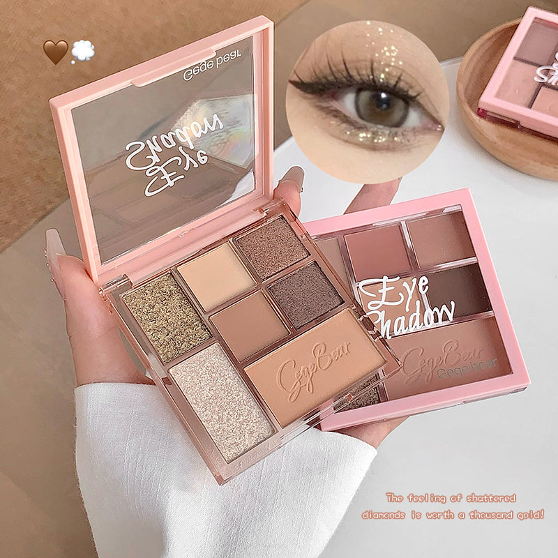 Makeup palette with eye shadows and a close-up of an eye wearing the makeup.