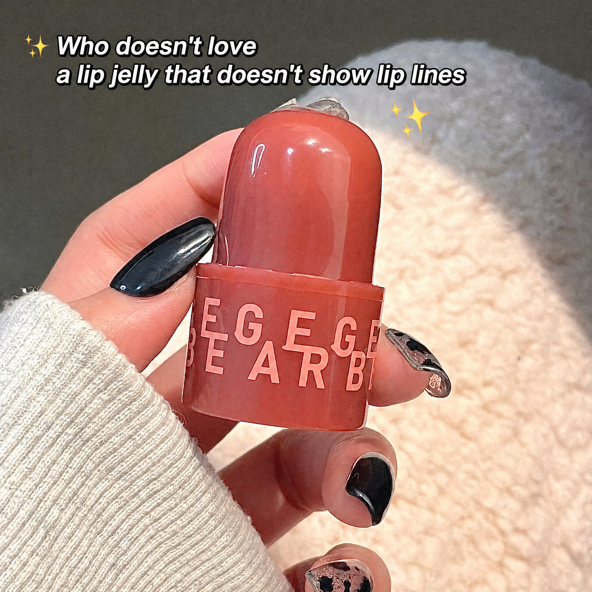 Lip jelly product held by a hand with text overlay