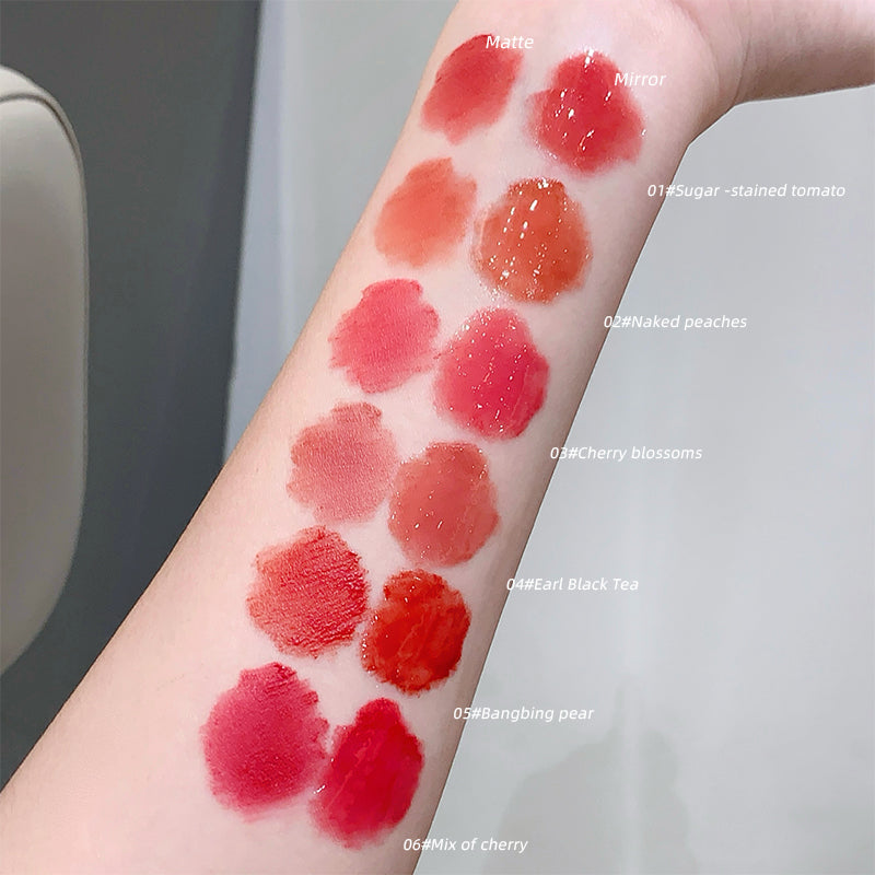 Lipstick swatches on a person's arm with color names labeled