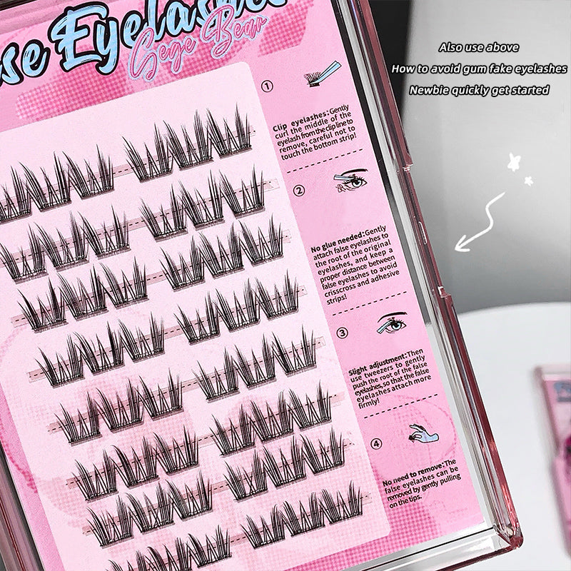 False eyelashes packaging with pink background and text instructions.