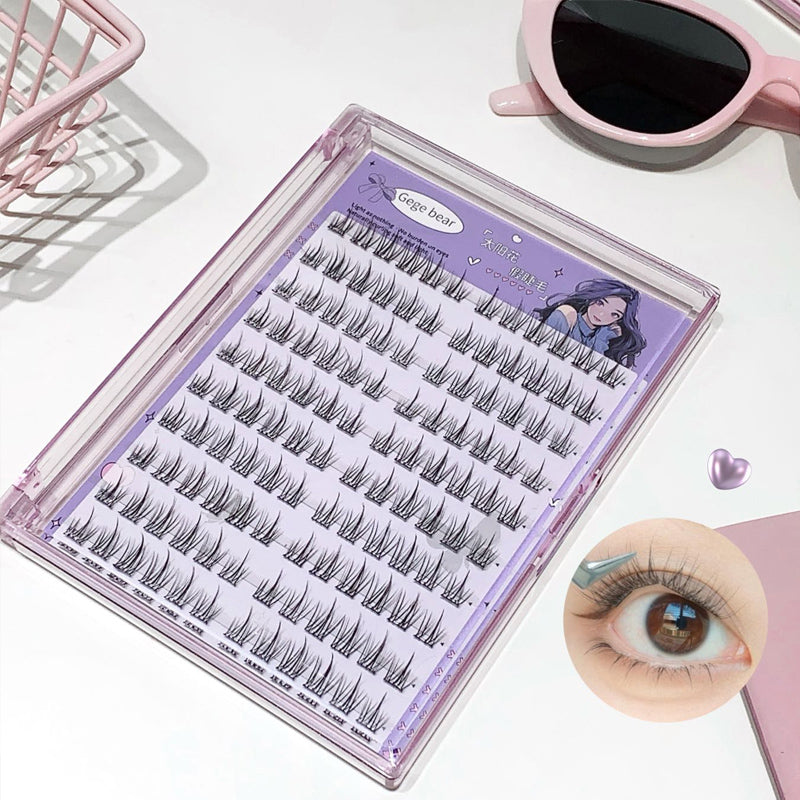 False eyelashes in a purple case with an inset of an eye wearing the lashes.