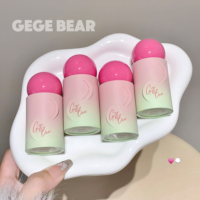 Five small bottles with pink caps on a white dish, branded 'GEGE BEAR'.