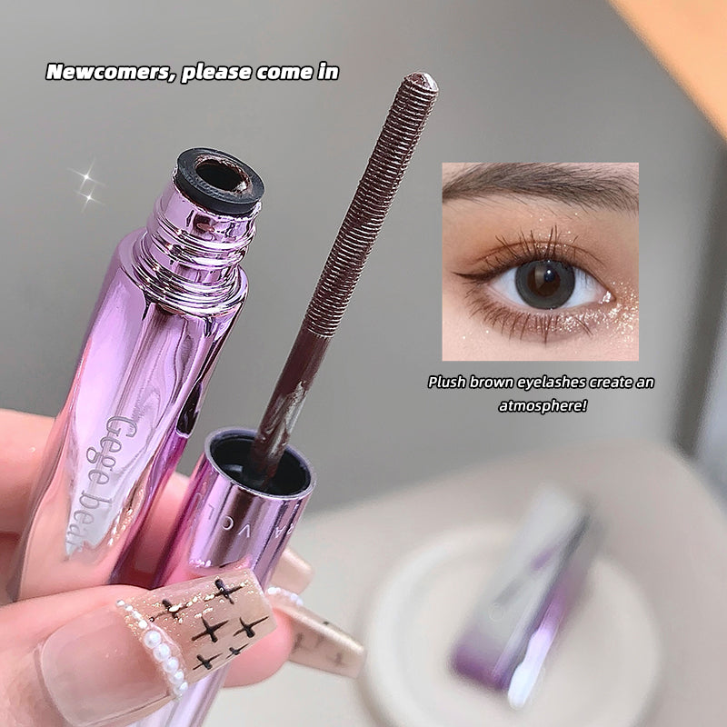 Purple eyelash product with applicator and close-up of an eye wearing the lashes.