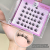 False eyelashes in a clear case with a pink label, held by a hand.
