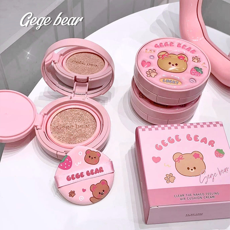 Pink cosmetic products with bear design and 'Gege bear' branding on a white surface.