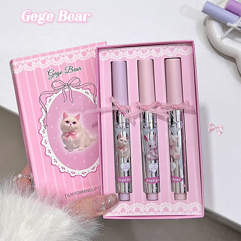 Pink lip product set with 'Gege Bear' branding on a white background