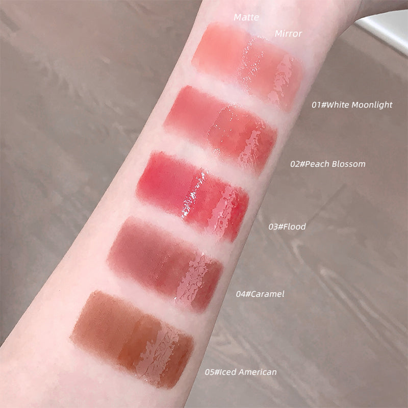 Lipstick swatches on a person's arm with color names and shades.