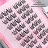 Multiple false eyelashes on a pink tray with text overlay