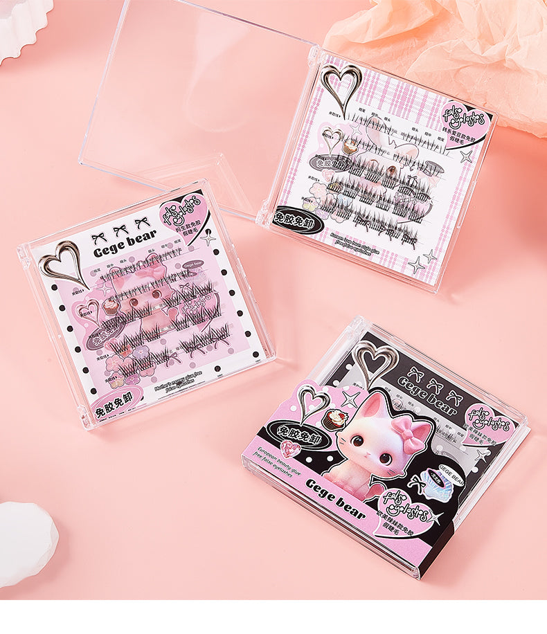 Three clear plastic cases with cartoon character designs on a pink background