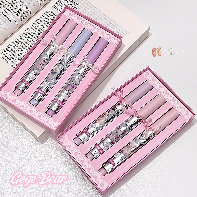 Set of lip products in pink boxes with 'Gege Bear' branding.