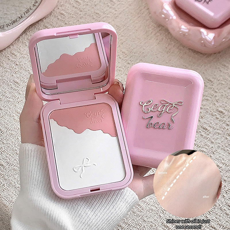 Pink compact mirror with 'Cece Bear' branding held by a hand on a textured surface.