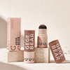 Makeup products with 'GEGE BEAR' branding on a neutral background