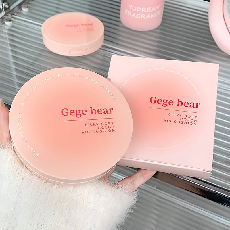 Gege bear silky soft color air cushion with packaging on a reflective surface