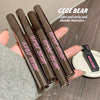 Five GEGE BEAR mascara tubes held in a hand with a blurred background