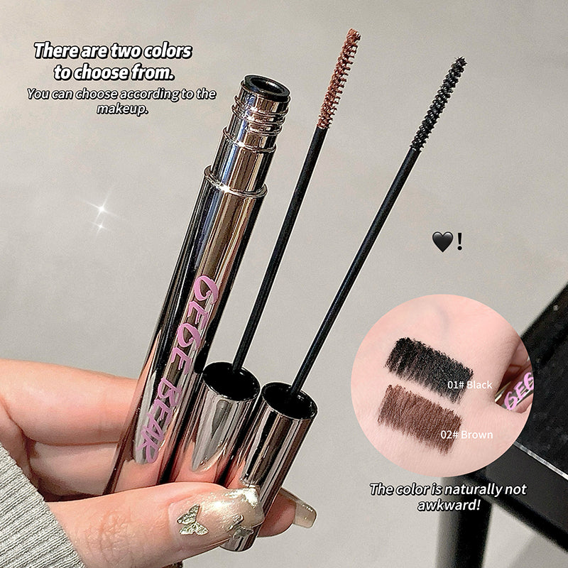 Eyebrow pencil with black and brown color options held by a hand.