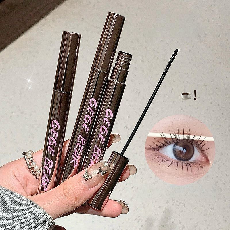 Three bottles of GEGE BEAR mascara held by a hand, with an inset showing an eye wearing the mascara.