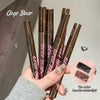 Hand holding multiple Gege Bear makeup products with color swatches on a neutral background