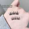 False eyelashes displayed on a hand with a neutral background