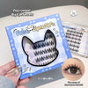 False eyelashes packaging with a hand holding it and an inset showing the effect on eyes.