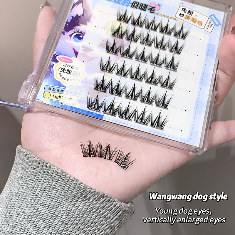 Set of false eyelashes with packaging on a hand, labeled 'Wangwang dog style'.