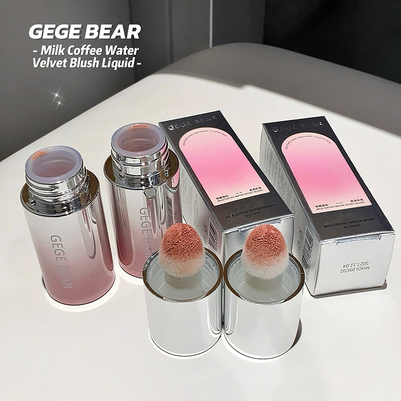 Makeup products including bottles and a brush with 'GEGE BEAR' branding on a white surface.