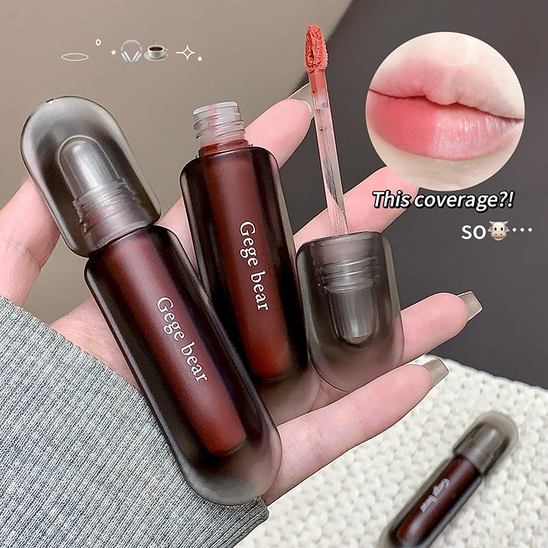 Lip gloss with applicator and close-up of lips, labeled 'Gege bear'.