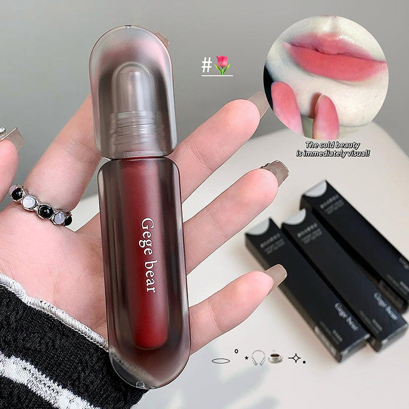 Red lipstick held by a hand with 'Gege bear' branding, close-up of lips wearing the lipstick, and additional lipsticks in the background.