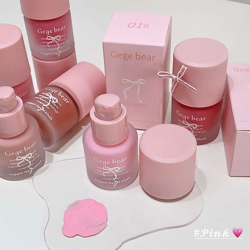 Pink Gege bear skincare products on a white background