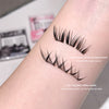 False eyelashes displayed on a person's arm with text labels.