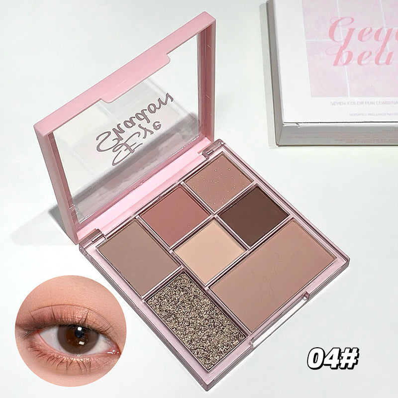 Makeup palette with eyeshadows and a close-up of an eye wearing the product, on a white background.