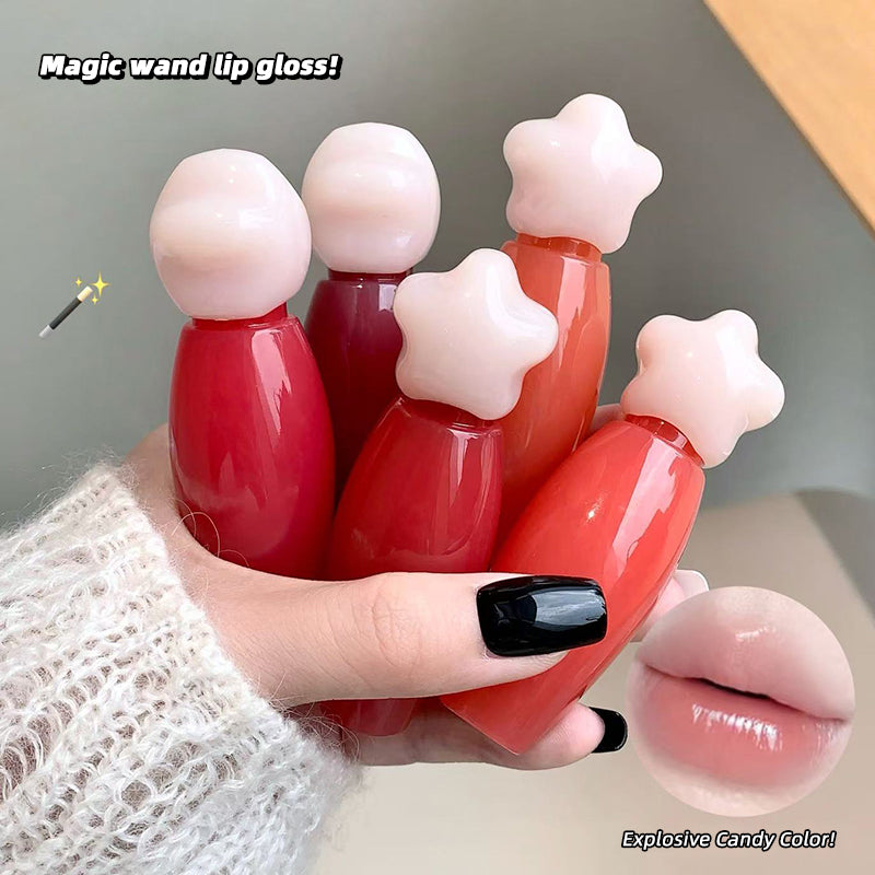 Hand holding red lip gloss with star-shaped applicators and a close-up of lips with glossy finish.