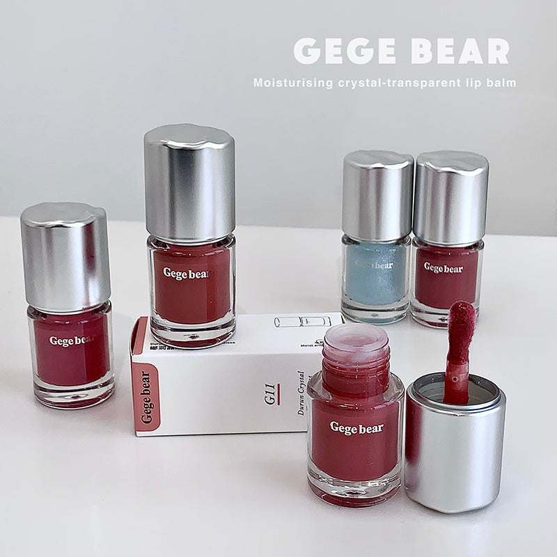 Gege bear lip balm and nail polish set on a white background