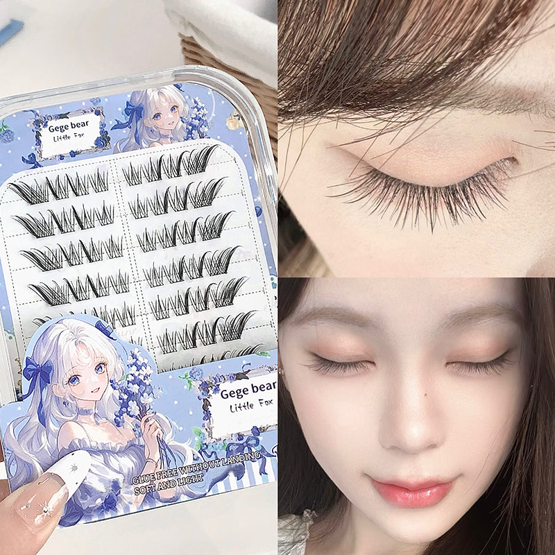 False eyelashes in a box with a decorative cover, applied to a person's eye.